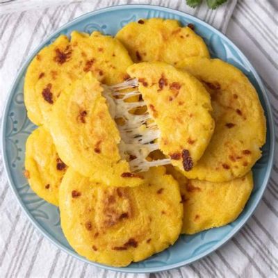  Arepas de Queso: Savory Grilled Corn Cakes Filled with Gooey Melted Cheese